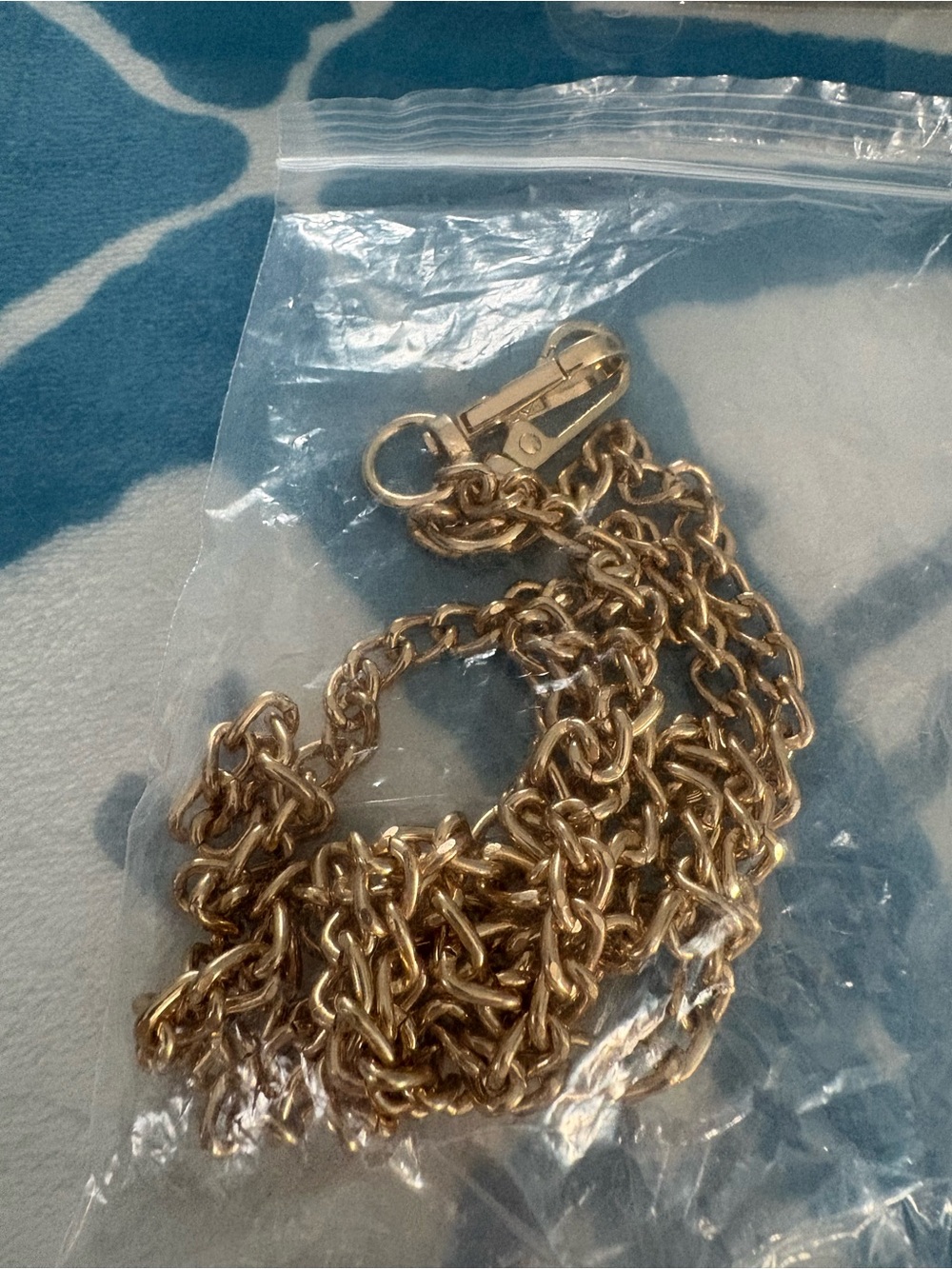 Cross body handbag chain